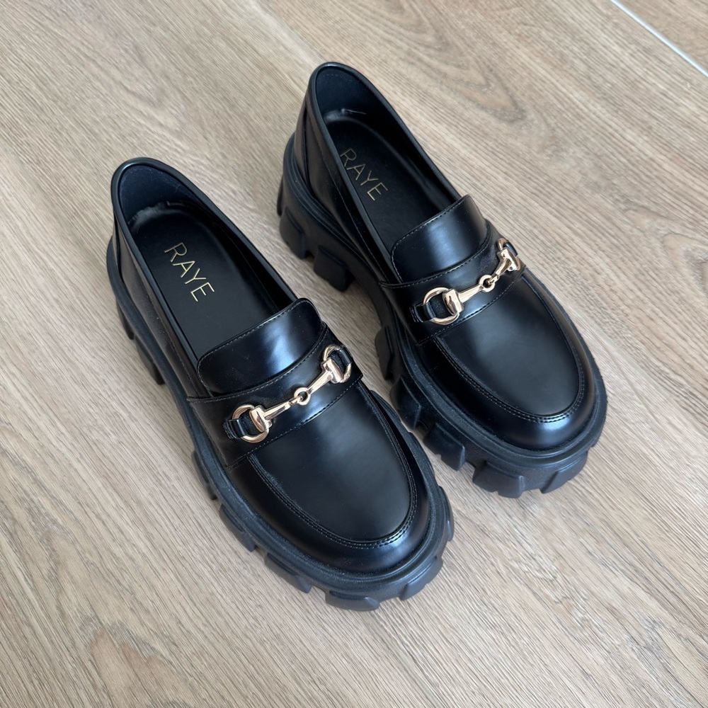 RAYE Black Loafers with Gold Accent